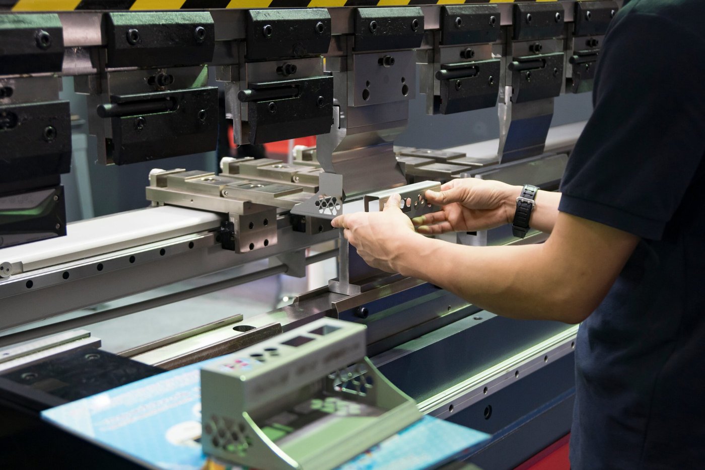 Sheet metal being formed at a press brake